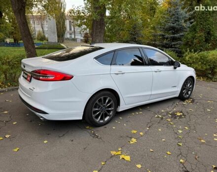 Білий Форд Фьюжен, об'ємом двигуна 2 л та пробігом 303 тис. км за 12940 $, фото 4 на Automoto.ua