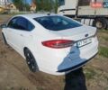 Білий Форд Фьюжен, об'ємом двигуна 2 л та пробігом 230 тис. км за 13900 $, фото 3 на Automoto.ua