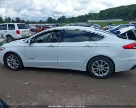 Білий Форд Фьюжен, об'ємом двигуна 2 л та пробігом 118 тис. км за 2100 $, фото 13 на Automoto.ua