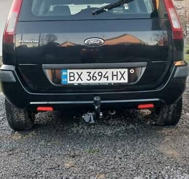 Черный Форд Фьюжн, объемом двигателя 1.4 л и пробегом 237 тыс. км за 4200 $, фото 11 на Automoto.ua