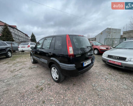 Черный Форд Фьюжн, объемом двигателя 1.4 л и пробегом 168 тыс. км за 4200 $, фото 6 на Automoto.ua