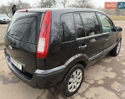 Черный Форд Фьюжн, объемом двигателя 1.4 л и пробегом 216 тыс. км за 3890 $, фото 7 на Automoto.ua