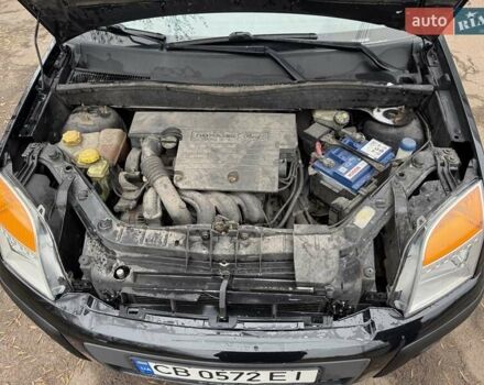 Черный Форд Фьюжн, объемом двигателя 1.4 л и пробегом 216 тыс. км за 3890 $, фото 25 на Automoto.ua