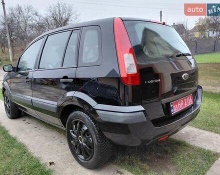Черный Форд Фьюжн, объемом двигателя 1.4 л и пробегом 180 тыс. км за 4550 $, фото 7 на Automoto.ua