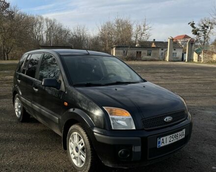 Черный Форд Фьюжн, объемом двигателя 1.4 л и пробегом 267 тыс. км за 4000 $, фото 6 на Automoto.ua