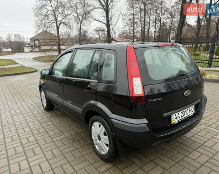 Черный Форд Фьюжн, объемом двигателя 1.6 л и пробегом 147 тыс. км за 4300 $, фото 5 на Automoto.ua