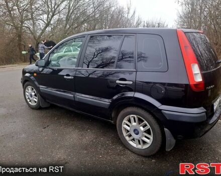 Черный Форд Фьюжн, объемом двигателя 1.4 л и пробегом 218 тыс. км за 5000 $, фото 2 на Automoto.ua