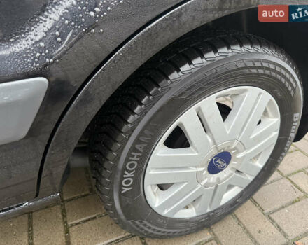 Черный Форд Фьюжн, объемом двигателя 1.6 л и пробегом 147 тыс. км за 4300 $, фото 12 на Automoto.ua