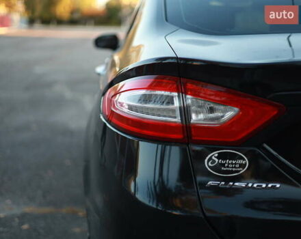 Форд Фьюжн 2013 в Валках на Automoto.ua Черный Форд Фьюжн, объемом двигателя 2.49 л и пробегом 144 тыс. км за 9700 $, фото 5 на Automoto.ua