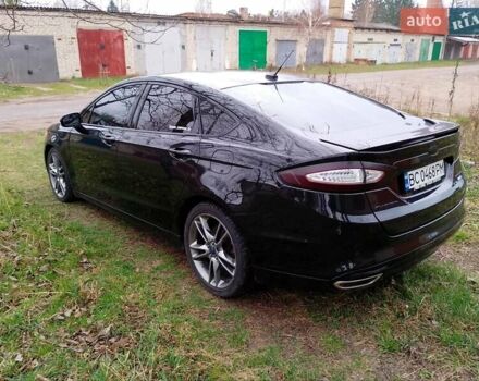 Чорний Форд Фьюжен, об'ємом двигуна 2 л та пробігом 222 тис. км за 12000 $, фото 6 на Automoto.ua