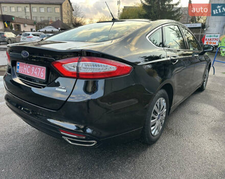 Чорний Форд Фьюжен, об'ємом двигуна 2 л та пробігом 120 тис. км за 10900 $, фото 13 на Automoto.ua