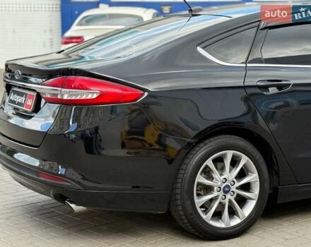 Чорний Форд Фьюжен, об'ємом двигуна 2 л та пробігом 200 тис. км за 15290 $, фото 4 на Automoto.ua