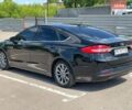Чорний Форд Фьюжен, об'ємом двигуна 2 л та пробігом 218 тис. км за 12600 $, фото 8 на Automoto.ua