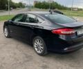Чорний Форд Фьюжен, об'ємом двигуна 2 л та пробігом 170 тис. км за 11999 $, фото 4 на Automoto.ua