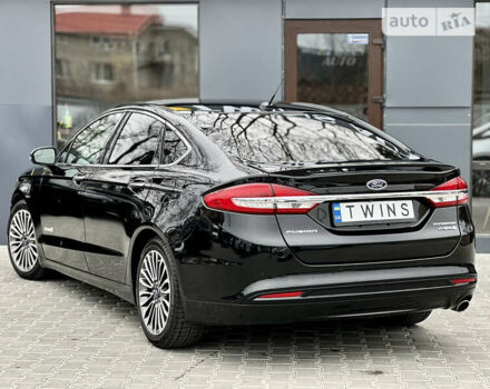 Чорний Форд Фьюжен, об'ємом двигуна 2 л та пробігом 111 тис. км за 17900 $, фото 5 на Automoto.ua