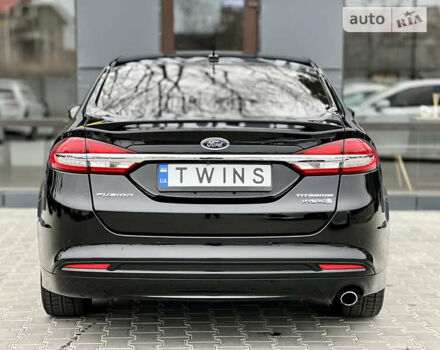 Чорний Форд Фьюжен, об'ємом двигуна 2 л та пробігом 111 тис. км за 17900 $, фото 4 на Automoto.ua