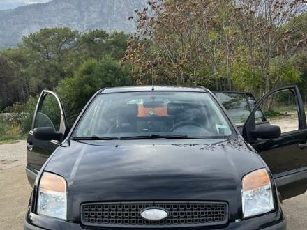 Черный Форд Фьюжн, объемом двигателя 1.39 л и пробегом 245 тыс. км за 5200 $, фото 1 на Automoto.ua