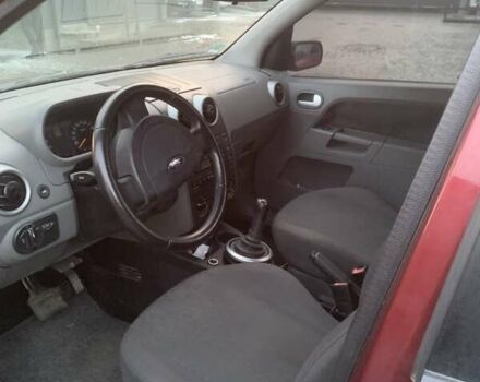 Красный Форд Фьюжн, объемом двигателя 1.39 л и пробегом 282 тыс. км за 3800 $, фото 3 на Automoto.ua