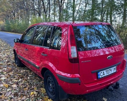 Красный Форд Фьюжн, объемом двигателя 1.4 л и пробегом 132 тыс. км за 4200 $, фото 4 на Automoto.ua