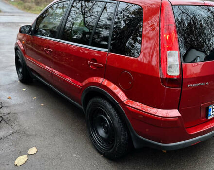 Красный Форд Фьюжн, объемом двигателя 1.4 л и пробегом 219 тыс. км за 5150 $, фото 9 на Automoto.ua