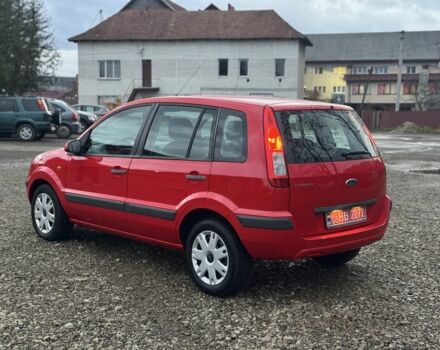 Красный Форд Фьюжн, объемом двигателя 1.4 л и пробегом 195 тыс. км за 4750 $, фото 7 на Automoto.ua