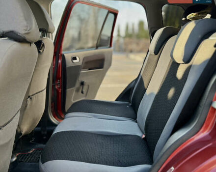 Красный Форд Фьюжн, объемом двигателя 1.4 л и пробегом 185 тыс. км за 4899 $, фото 21 на Automoto.ua