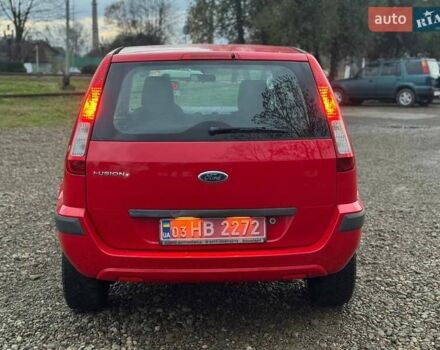 Красный Форд Фьюжн, объемом двигателя 1.4 л и пробегом 197 тыс. км за 4850 $, фото 12 на Automoto.ua