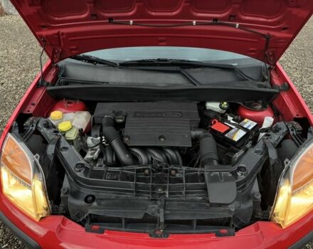 Красный Форд Фьюжн, объемом двигателя 1.4 л и пробегом 195 тыс. км за 4750 $, фото 20 на Automoto.ua