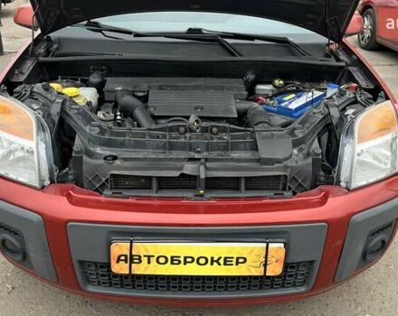 Красный Форд Фьюжн, объемом двигателя 1.39 л и пробегом 131 тыс. км за 5500 $, фото 18 на Automoto.ua