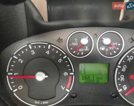 Красный Форд Фьюжн, объемом двигателя 1.4 л и пробегом 160 тыс. км за 5900 $, фото 2 на Automoto.ua