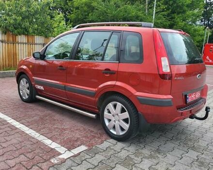 Красный Форд Фьюжн, объемом двигателя 1.4 л и пробегом 195 тыс. км за 4999 $, фото 4 на Automoto.ua