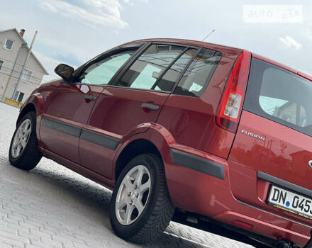 Красный Форд Фьюжн, объемом двигателя 1.4 л и пробегом 169 тыс. км за 5650 $, фото 24 на Automoto.ua