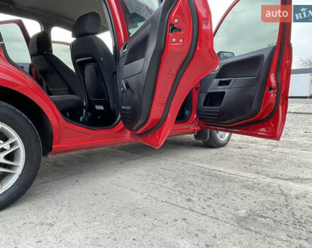 Червоний Форд Фьюжен, об'ємом двигуна 1.2 л та пробігом 210 тис. км за 3950 $, фото 22 на Automoto.ua