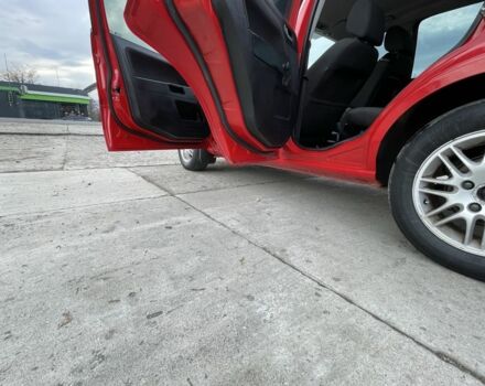 Червоний Форд Фьюжен, об'ємом двигуна 1.2 л та пробігом 210 тис. км за 3950 $, фото 10 на Automoto.ua