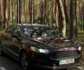 Красный Форд Фьюжн, объемом двигателя 2 л и пробегом 300 тыс. км за 9000 $, фото 1 на Automoto.ua