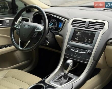 Красный Форд Фьюжн, объемом двигателя 1.6 л и пробегом 156 тыс. км за 8500 $, фото 17 на Automoto.ua