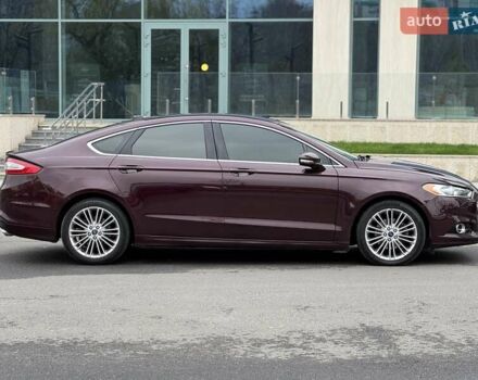 Красный Форд Фьюжн, объемом двигателя 1.6 л и пробегом 156 тыс. км за 8500 $, фото 7 на Automoto.ua