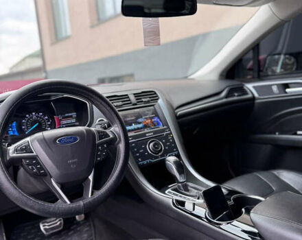 Красный Форд Фьюжн, объемом двигателя 2 л и пробегом 202 тыс. км за 8300 $, фото 10 на Automoto.ua