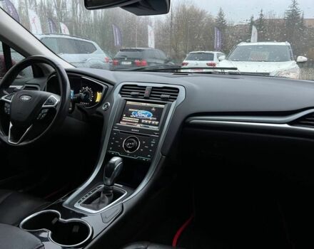 Красный Форд Фьюжн, объемом двигателя 2 л и пробегом 135 тыс. км за 9500 $, фото 15 на Automoto.ua