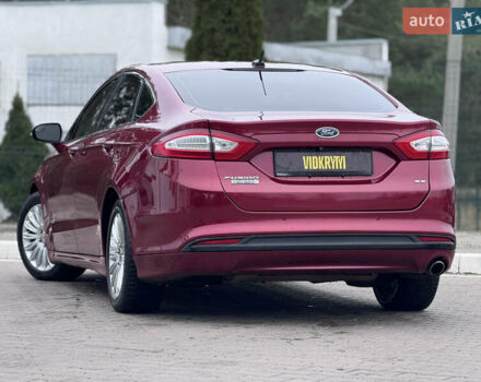 Красный Форд Фьюжн, объемом двигателя 2 л и пробегом 210 тыс. км за 10500 $, фото 16 на Automoto.ua