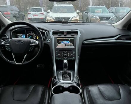 Красный Форд Фьюжн, объемом двигателя 2 л и пробегом 135 тыс. км за 9500 $, фото 9 на Automoto.ua