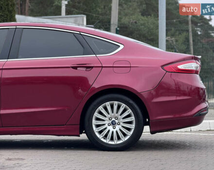 Красный Форд Фьюжн, объемом двигателя 2 л и пробегом 210 тыс. км за 10500 $, фото 7 на Automoto.ua