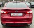 Красный Форд Фьюжн, объемом двигателя 2 л и пробегом 135 тыс. км за 9500 $, фото 5 на Automoto.ua