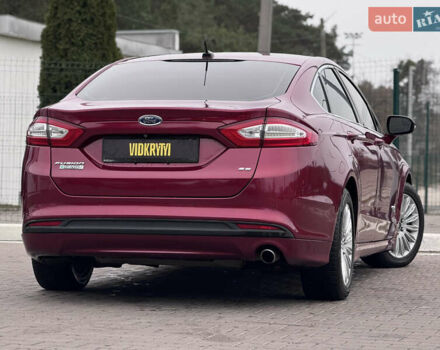 Красный Форд Фьюжн, объемом двигателя 2 л и пробегом 210 тыс. км за 10500 $, фото 13 на Automoto.ua