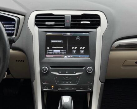 Красный Форд Фьюжн, объемом двигателя 2 л и пробегом 210 тыс. км за 10500 $, фото 16 на Automoto.ua