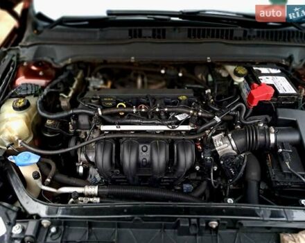 Красный Форд Фьюжн, объемом двигателя 2.5 л и пробегом 191 тыс. км за 8990 $, фото 13 на Automoto.ua