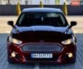 Красный Форд Фьюжн, объемом двигателя 2 л и пробегом 220 тыс. км за 12500 $, фото 1 на Automoto.ua