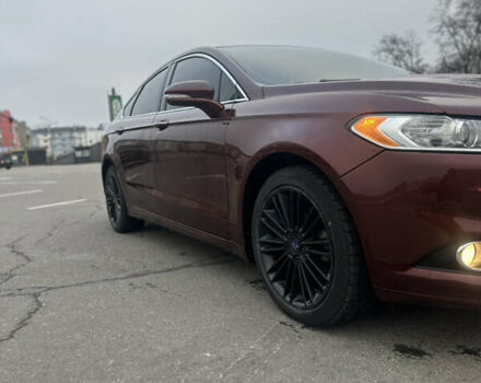 Красный Форд Фьюжн, объемом двигателя 2 л и пробегом 143 тыс. км за 10300 $, фото 6 на Automoto.ua