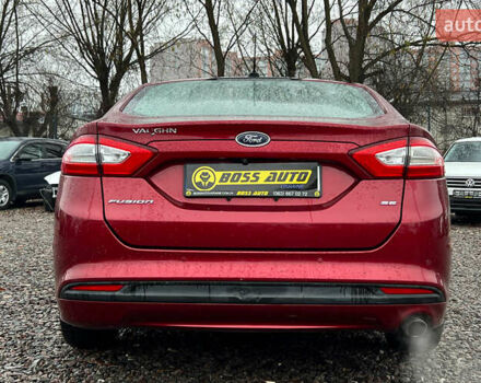 Красный Форд Фьюжн, объемом двигателя 2.49 л и пробегом 181 тыс. км за 11800 $, фото 4 на Automoto.ua