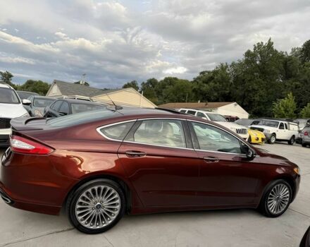 Красный Форд Фьюжн, объемом двигателя 2 л и пробегом 70 тыс. км за 4800 $, фото 7 на Automoto.ua